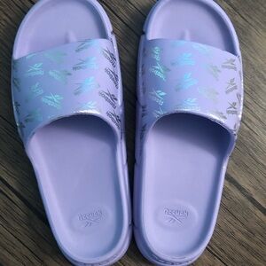 Women’s Reebok slides, size 8